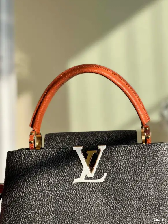 First bag MM LOUIS VUITTON CAPUCINES 0518